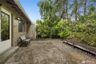 Private backyard patio off french doors in living room