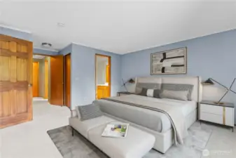 Large primary bedroom with en suite bathroom- virtually staged