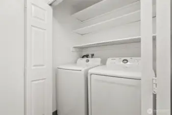 Laundry room downstairs washer and dryer stay