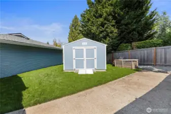 This Newer TUFF shed (March 2022) will stay with the home- as does the mower inside, so you can mow that beautiful new lawn! The pad is a great spot for RV or Boat parking-and its behnd the fence.