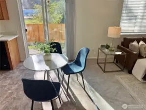 Dining area off kitchen with slider to west facing fenced back yard