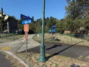 Park with playground and seating is just steps away up the street.  At the far end of park is access to the Interurban Trail