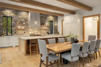 Plenty of seating at the over sized island and dining table.