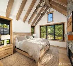 Vaulted ceilings with exposed beams in the Primary bedroom