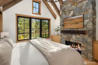 Primary bedroom w gas fireplace