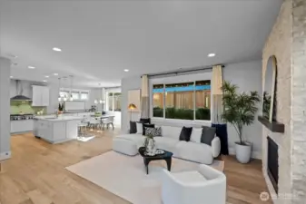 Step inside to open concept living - perfect for entertaining large parties or just enjoying a quiet evening at home.The 9ft ceilings, wood floors and gas fireplace bring warmth and charm to the space.