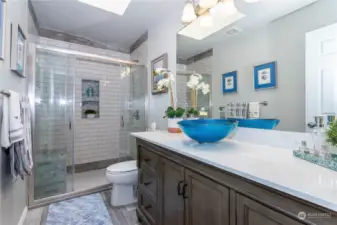 Beautiful fully remodeled 3/4 bath on upper floor. Shower doors roll and magnetize together.