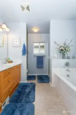 Five-piece primary bathroom with quartz counter and new sinks