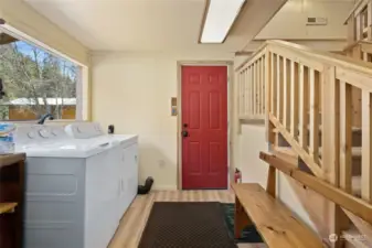 Expansive main floor utility room just off the garage door.