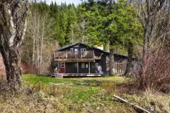 View of the river side of the cabin. You have an upper deck or lower deck to sit back & watch what nature has to offer.