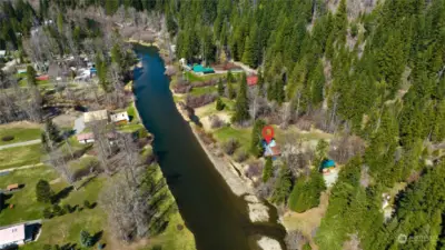 Another aerial view of the cabin and the river.