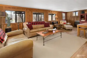 More view of the living area. Large enough to seat all your guest. Notice the beautiful LVP floors? Very durable and easy maintenance for the river front life style.