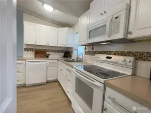 A Cook’s Dream – With expansive counter space, this kitchen offers plenty of room for meal prep and entertaining. Thoughtfully designed with ample storage, it keeps everything organized and within easy reach, making cooking a joy!