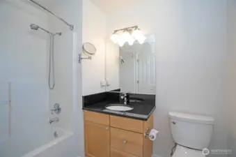Beautifully designed upper-level guest bathroom, thoughtfully crafted for comfort and style.
