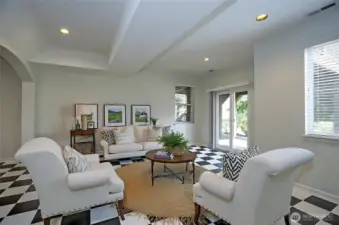 Generously sized, light-filled lower-level family room, thoughtfully designed for seamless entertaining and versatile living - virtually staged for inspiration.