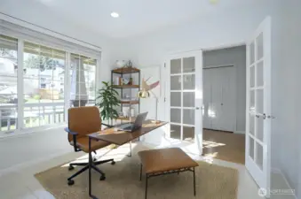 As you step inside, French doors welcome you into the main-level office/den, bathed in abundant natural light - virtually staged.