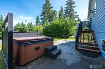 Hot tub with easy stair access to main level.