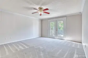 Primary Bedroom with French doors to back deck