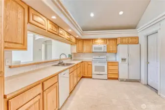 Large open kitchen with garage door access.