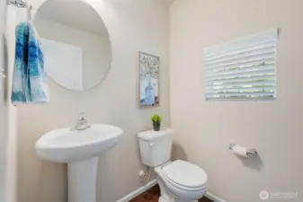Located just a few steps away from the living area, the powder room is easy access for all your guests.