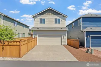 Plenty of room for 2 more cars in the driveway.