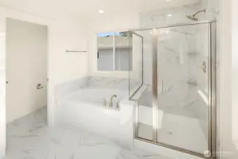 The beautifully finished 5 piece master bathroom