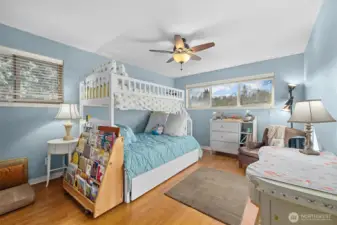 Bedroom, one of two on the main floor. Each bedroom has fitted closets for organized storage.