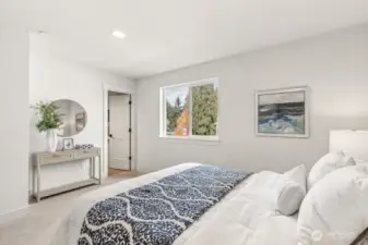 Second story bedroom with ensuite-bath. Interior photos are of the Sheridan model home at Maywood Heights. Same floor plan but colors and finishes will vary. Photos are for illustration purposes only.
