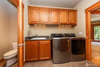 Laundry & 1/2 Bath just off the Garage