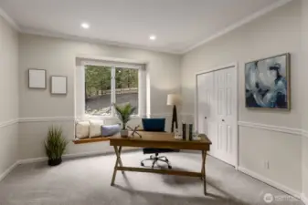 Main level  bedroom/office with connected bath and shower