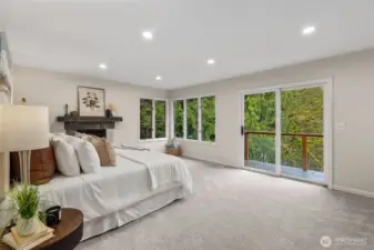 breathtaking primary with deck for morning and meditations gas fireplace for cozy weekend mornings