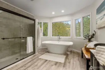 Large soaking tub with views of course
