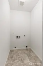 Lower floor laundry!!!  **Photos is a representation only. This is the same floorplan in the community, but a different homesite. Colors and features will vary**