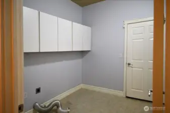Utility Room with cabinets