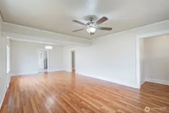 View of living room looking into the kitchen doorway.