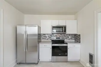 New appliances and backsplash installed.