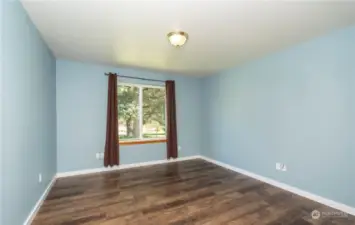 Bedroom with newer flooring