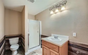 Bathroom with shiplap just off the garage