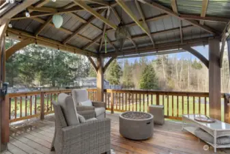 Gazebo with lights on a timer for year-round entertainment or relaxing! Pull down-shades, too.