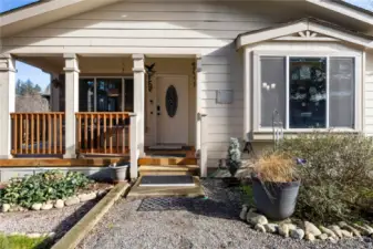 Covered front porch with wraparound deck