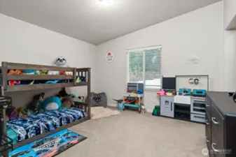 Bedrooms have tall vaulted ceilings