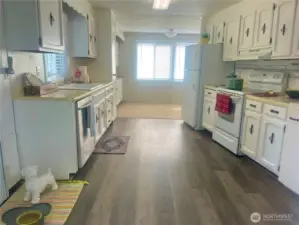 large kitchen with new flooring