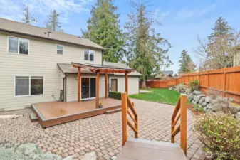 Backyard with covered deck to enjoy all year