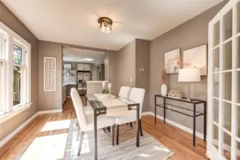 Dining Room with Kitchen in background