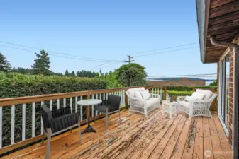 Deck off of the Living room. Virtually Staged