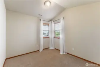 Bedroom 3 including vaulted ceilings