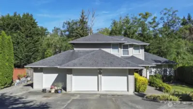 3 car garage & parking for 3 or 4 more.
