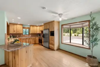 Kitchen with Maple Cabinets, Granite Counters and hardwood flooring