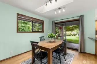 Dining room with sliding door out to patio and deck.