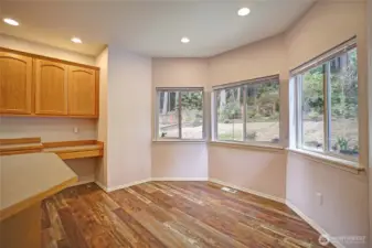 Kitchen offers a casual dining area with beautiful windows!